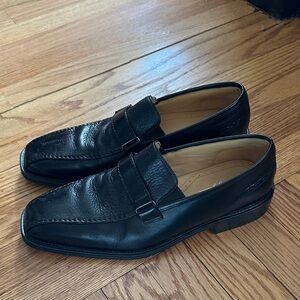 Brass Boot Black Leather Slip-On Loafers